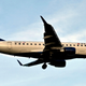 A Delta Airlines plan with its wheels down coming in for a landing.